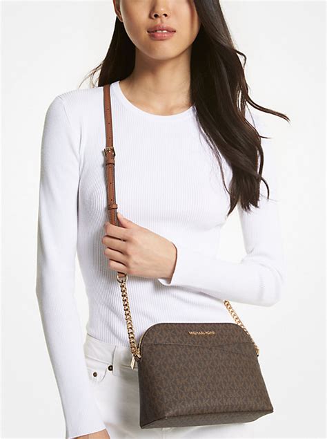 jet set cross body bag michael kors|Michael Kors bag with airplanes.